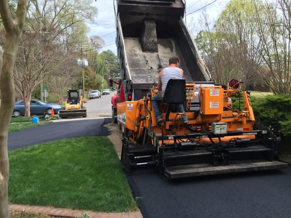 Circular residential asphalt driveway with clean edges in Chesterfield Virginia